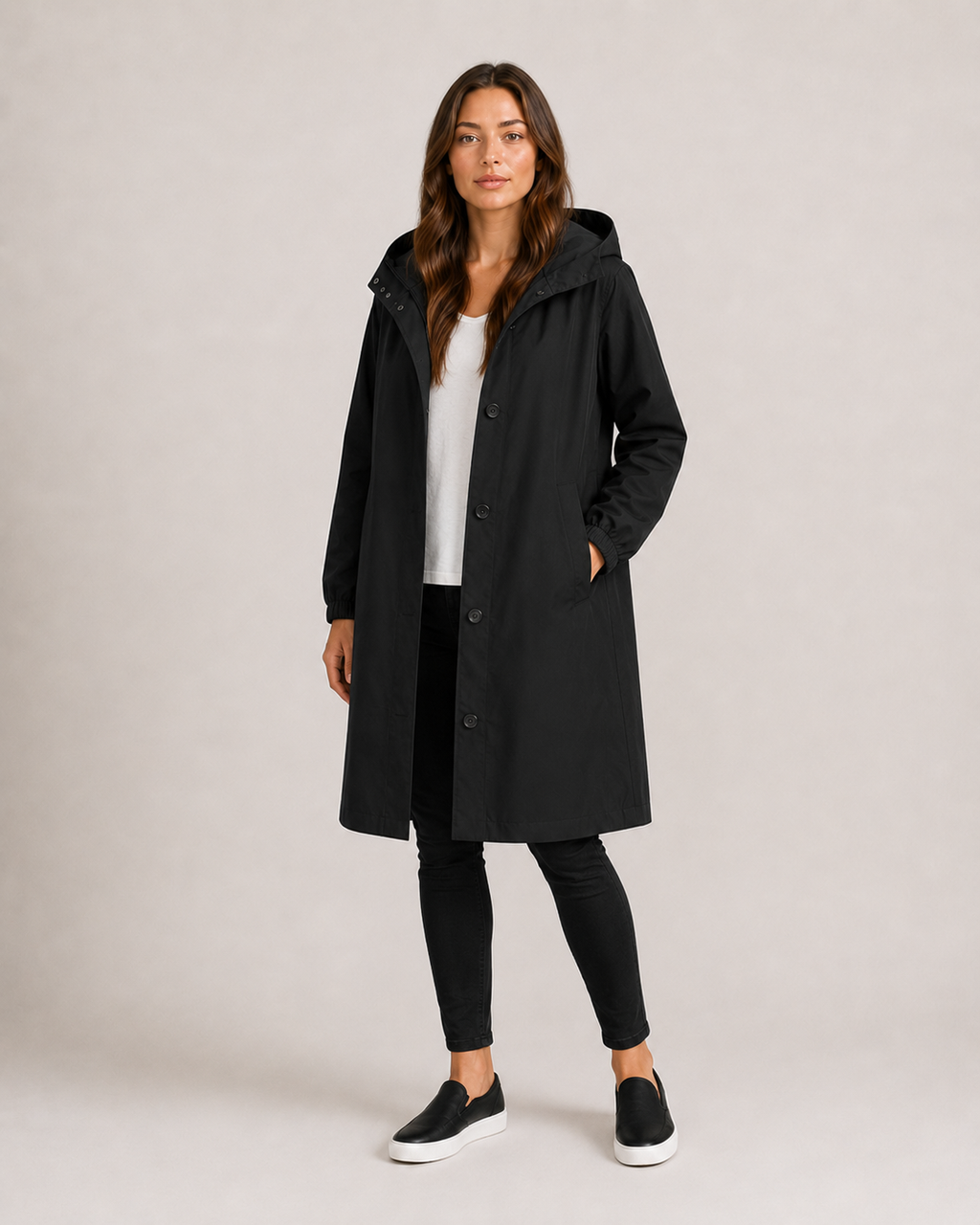 Hannelore - Lange regenjas met capuchon, knopensluiting en elastische manchetten