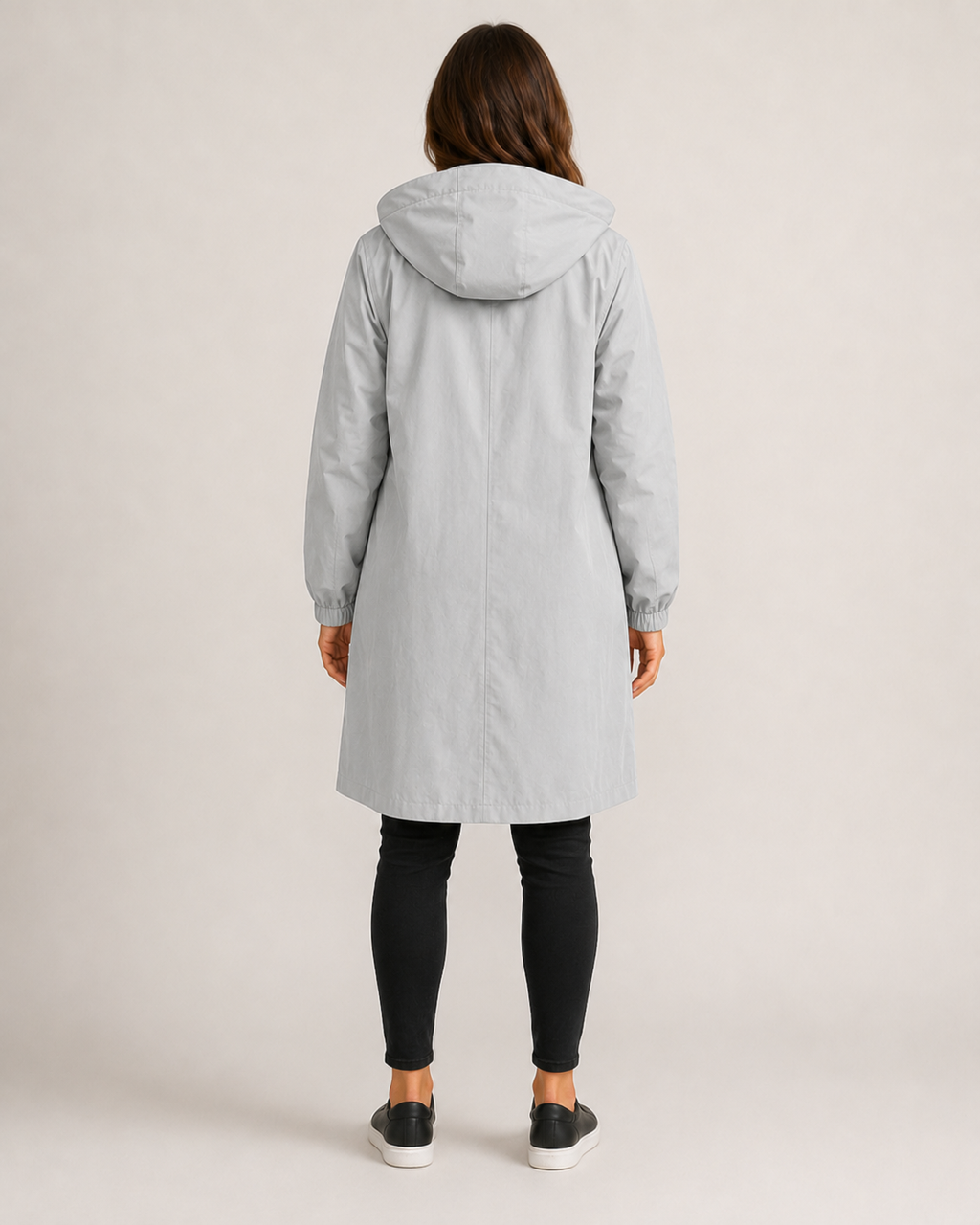 Hannelore - Lange regenjas met capuchon, knopensluiting en elastische manchetten